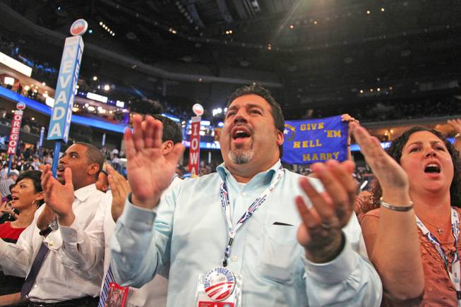 Andres Ramirez, a Democratic political consultant and Nevada delegate, cheers for Sen. Harry Reid after his speech to the Democratic National Convention in Charlotte, N.C. Tuesday night.